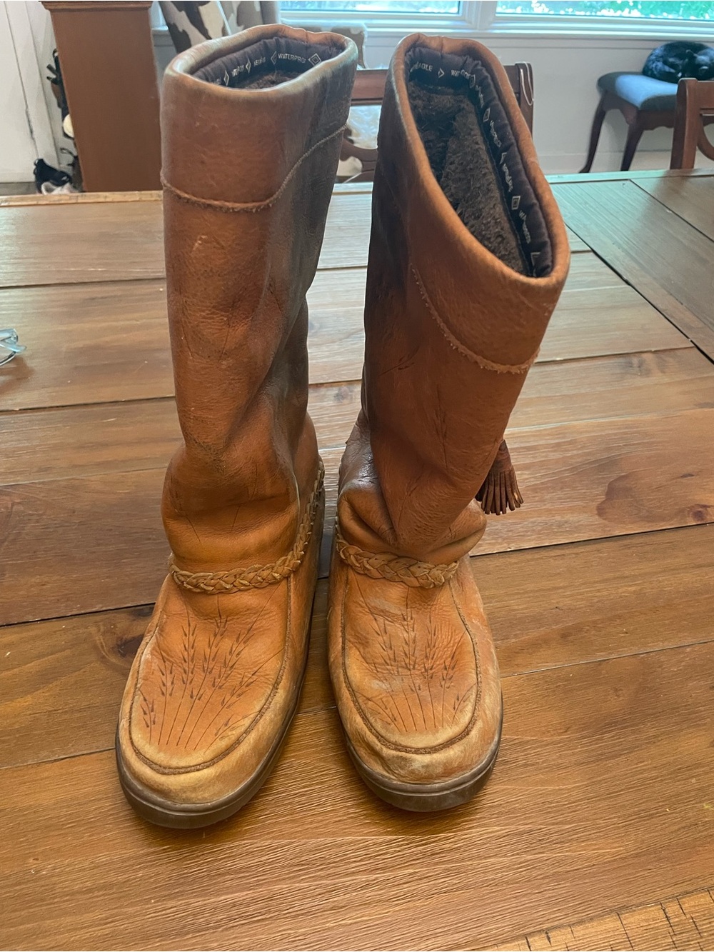 Women's Tan Leather Manitoba Moccasin Boots with Tassel Accent
